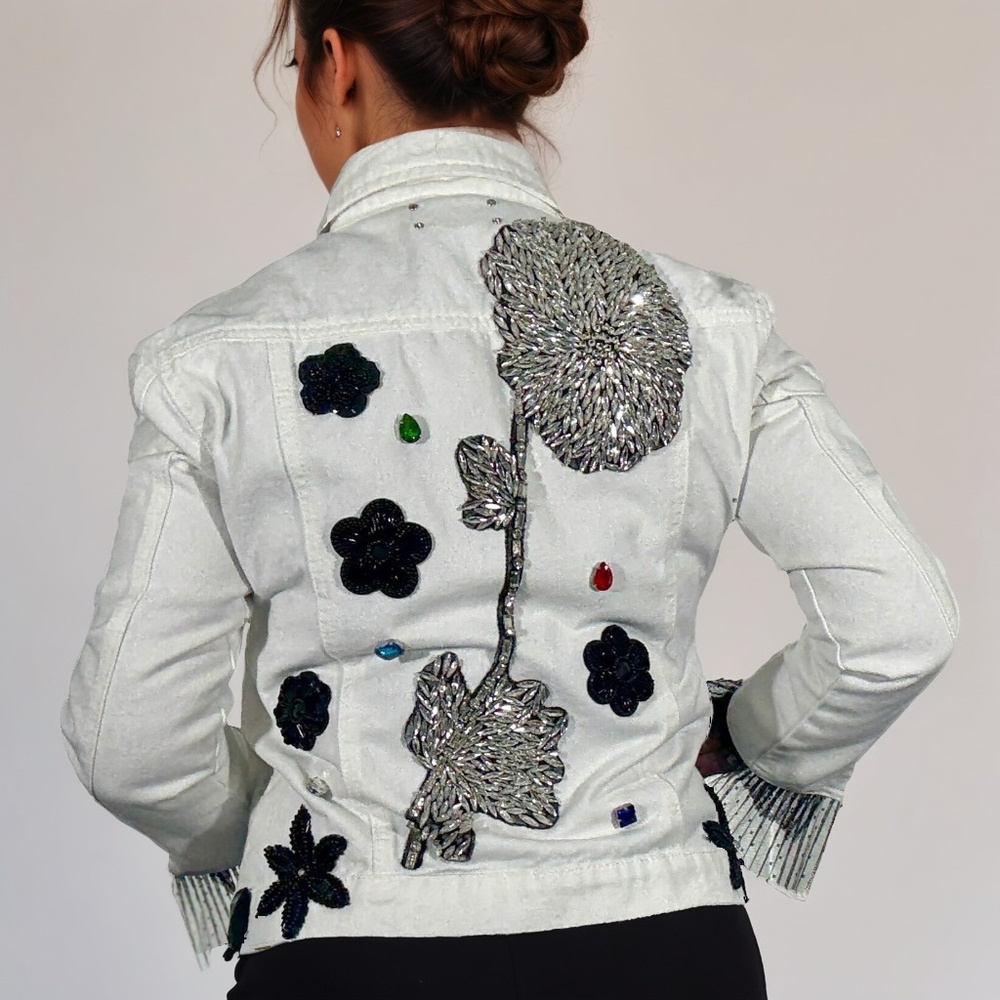 White Denim Jacket embellished with black lace appliqué and fringe sleeves